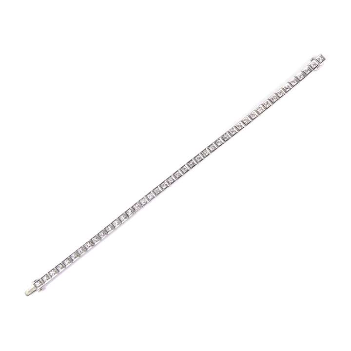 Diamond and platinum line bracelet, box collet set with 42 round brilliant cut diamonds